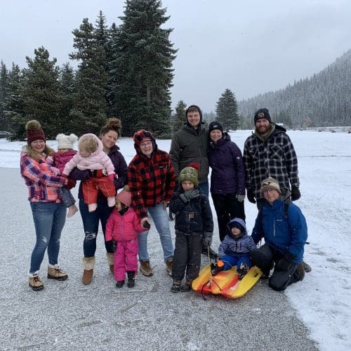 big family in the snow