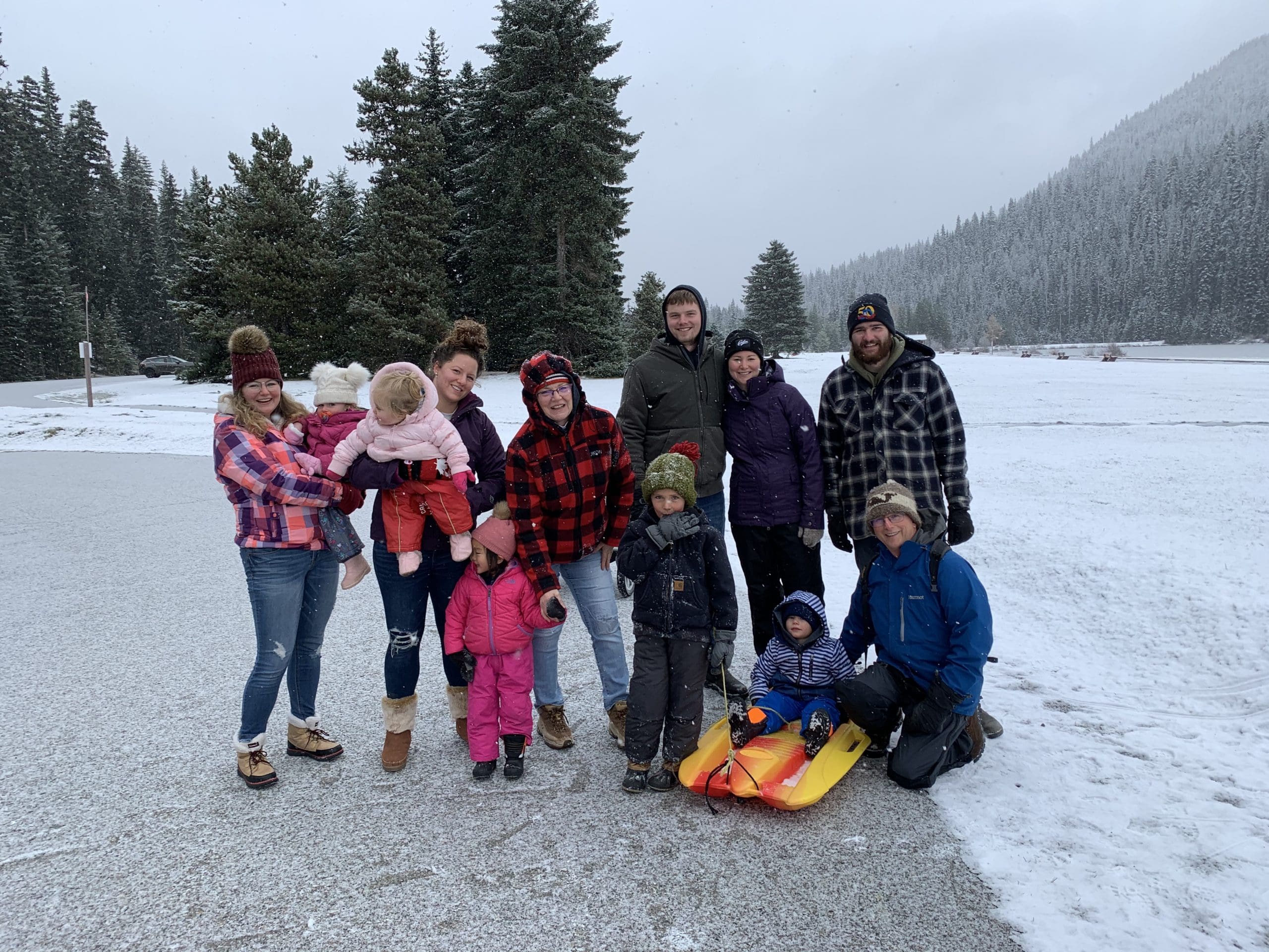 big family in the snow